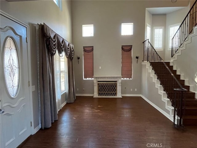 259 S California St, San Gabriel, CA 91776 - entrance foyer featuring a towering ceiling, stairs, plenty of natural light, and dark wood-style flooring