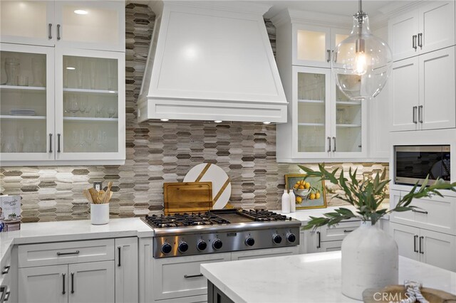 19 Dennis Ln, Ladera Ranch, CA 92694 - kitchen with appliances with stainless steel finishes, premium range hood, and white cabinets