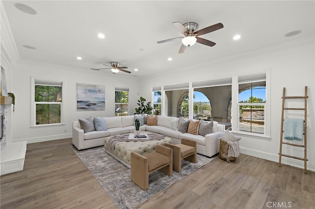 19 Dennis Ln, Ladera Ranch, CA 92694 - living area with wood finished floors, a ceiling fan, crown molding, and recessed lighting