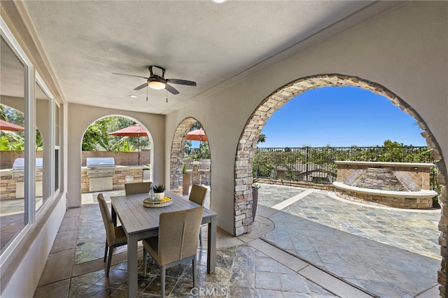 19 Dennis Ln, Ladera Ranch, CA 92694 - fenced backyard featuring exterior kitchen, a patio area, a ceiling fan, and outdoor dining space