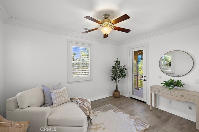 19 Dennis Ln, Ladera Ranch, CA 92694 - sitting room featuring wood finished floors, crown molding, and ceiling fan