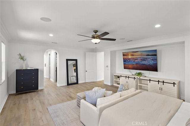 19 Dennis Ln, Ladera Ranch, CA 92694 - living area featuring arched walkways, a ceiling fan, light wood-type flooring, crown molding, and recessed lighting