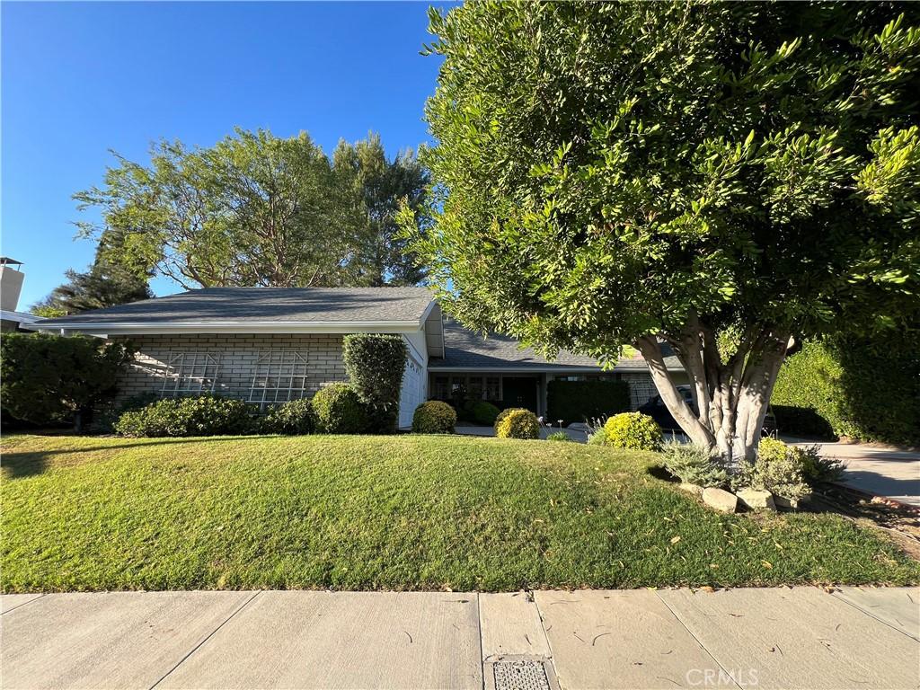4168 Towhee Dr, Calabasas, CA 91302 - view of front of house with a front lawn