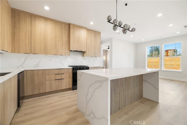 6638 Dolores Dr, Paradise, CA 95969 - kitchen featuring modern cabinets, gas stove, light brown cabinets, recessed lighting, and light wood-style flooring