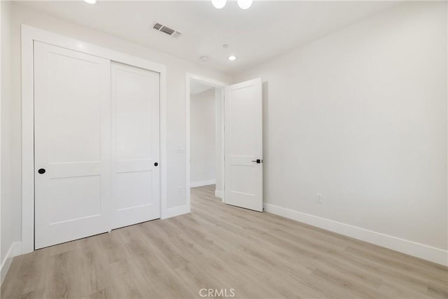 6638 Dolores Dr, Paradise, CA 95969 - unfurnished bedroom featuring light wood-style floors, a closet, and recessed lighting