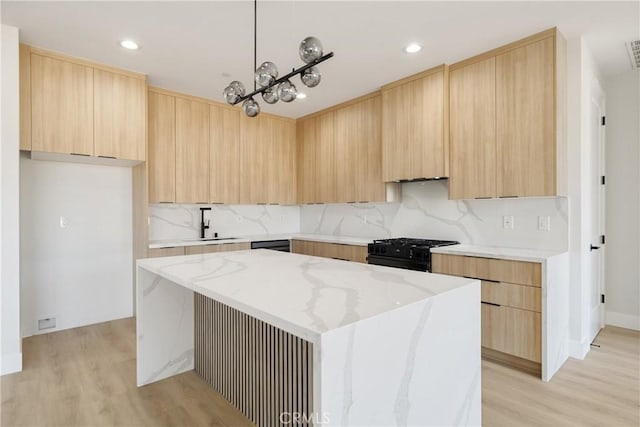 6638 Dolores Dr, Paradise, CA 95969 - kitchen with light brown cabinets, black range with gas cooktop, modern cabinets, and recessed lighting