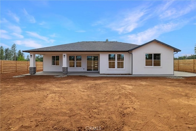 6638 Dolores Dr, Paradise, CA 95969 - back of house featuring a patio area, a fenced backyard, a shingled roof, and stucco siding