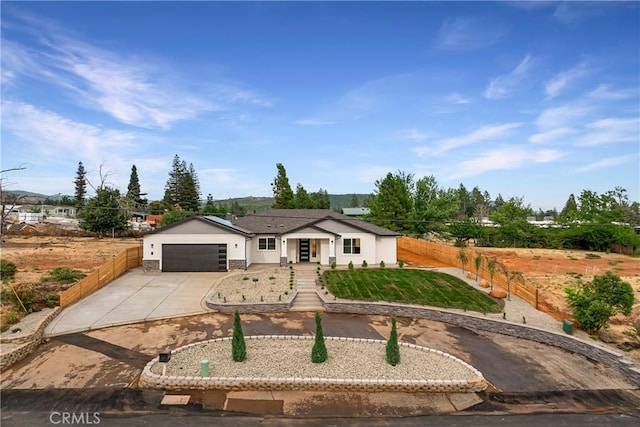 6638 Dolores Dr, Paradise, CA 95969 - ranch-style house with driveway and an attached garage
