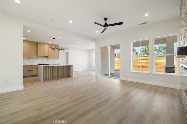 6638 Dolores Dr, Paradise, CA 95969 - unfurnished living room with recessed lighting, light wood-style flooring, and ceiling fan