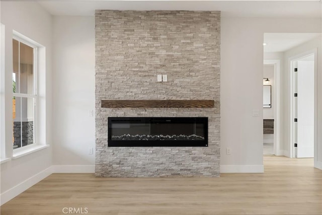 6638 Dolores Dr, Paradise, CA 95969 - detailed view of a stone fireplace and wood finished floors