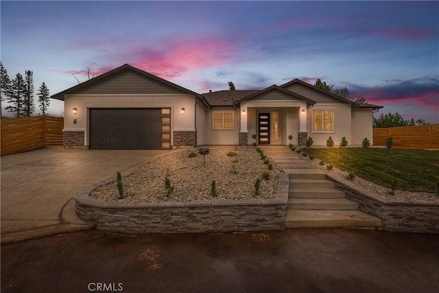 6638 Dolores Dr, Paradise, CA 95969 - ranch-style house featuring driveway, stucco siding, a garage, and stone siding