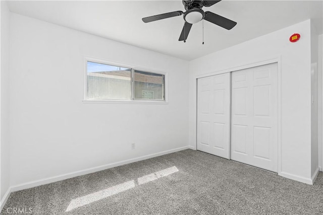 1920 Doolittle Ave, Bakersfield, CA 93304 - unfurnished bedroom featuring carpet flooring, a closet, and a ceiling fan