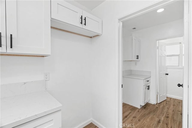 1920 Doolittle Ave, Bakersfield, CA 93304 - washroom featuring light wood finished floors and baseboards