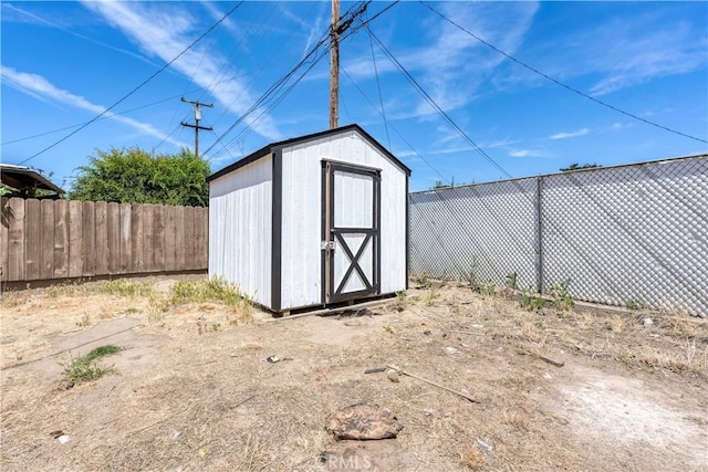 1920 Doolittle Ave, Bakersfield, CA 93304 - view of shed featuring a fenced backyard
