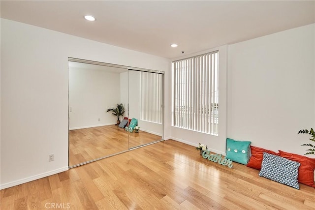 856 N Van Ness Ave Unit 3, Los Angeles, CA 90038 - workout room with wood finished floors and recessed lighting