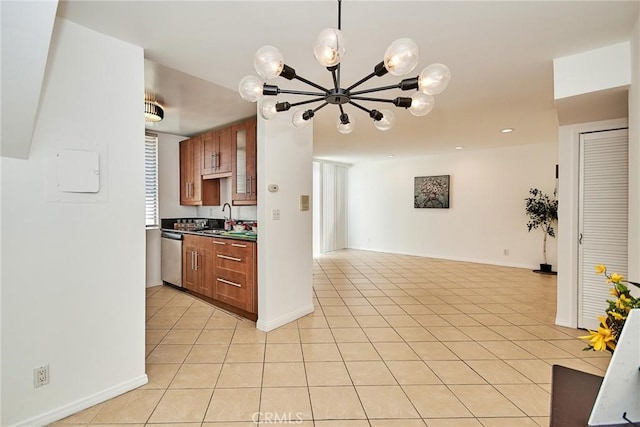856 N Van Ness Ave Unit 3, Los Angeles, CA 90038 - kitchen featuring dishwasher, dark countertops, light tile patterned floors, a chandelier, and open floor plan