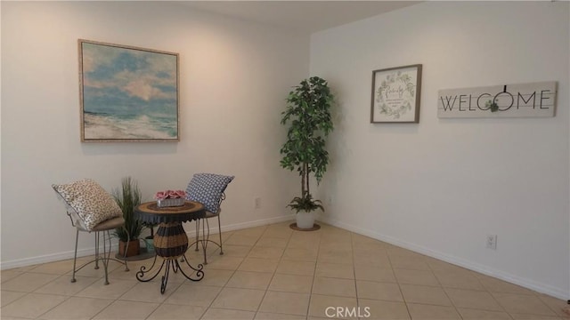 856 N Van Ness Ave Unit 3, Los Angeles, CA 90038 - sitting room featuring baseboards and light tile patterned flooring