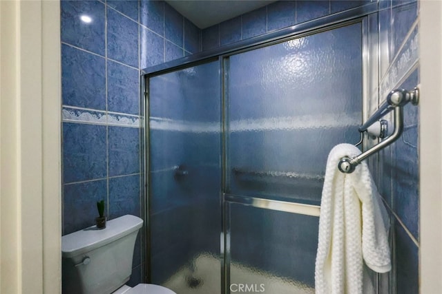 409 Burchett St Unit 311, Glendale, CA 91203 - bathroom featuring a shower with door and toilet