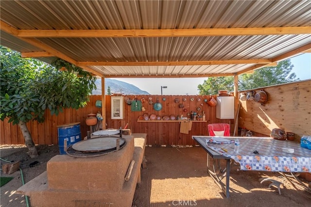 8873 Reche Canyon Rd, Colton, CA 92324 - view of patio / terrace with a mountain view