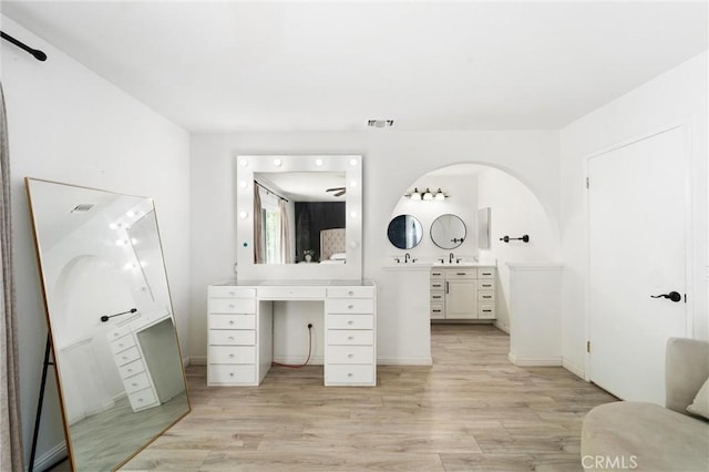 8873 Reche Canyon Rd, Colton, CA 92324 - bathroom featuring wood finished floors and vanity
