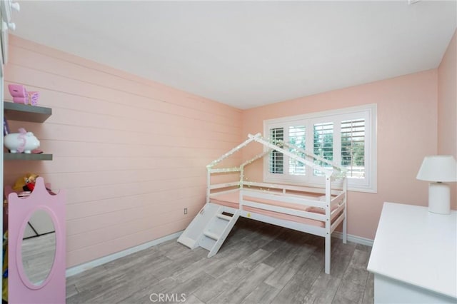 8873 Reche Canyon Rd, Colton, CA 92324 - bedroom with wood finished floors and wood walls