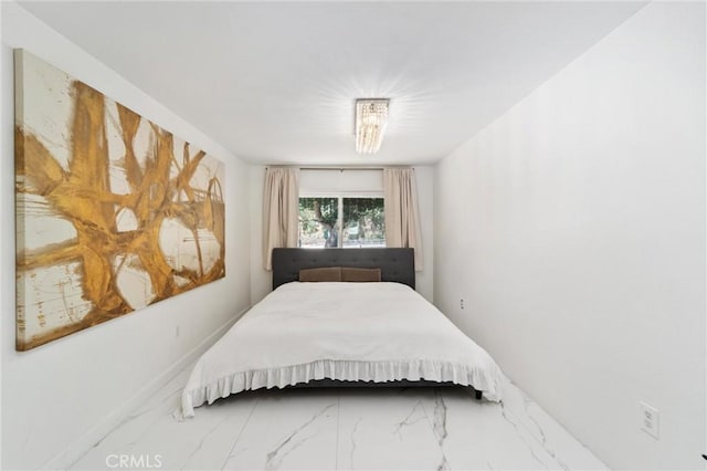 8873 Reche Canyon Rd, Colton, CA 92324 - bedroom featuring marble look tiles and baseboards