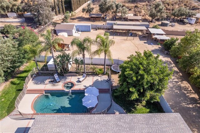 8873 Reche Canyon Rd, Colton, CA 92324 - aerial view of property and surrounding area with a pool area