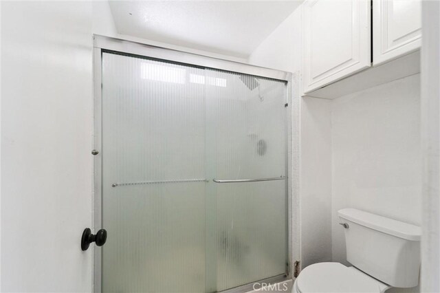 8873 Reche Canyon Rd, Colton, CA 92324 - full bath with toilet and a shower with door