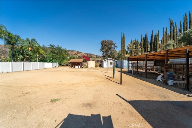 8873 Reche Canyon Rd, Colton, CA 92324 - view of yard with an outdoor structure and an exterior structure