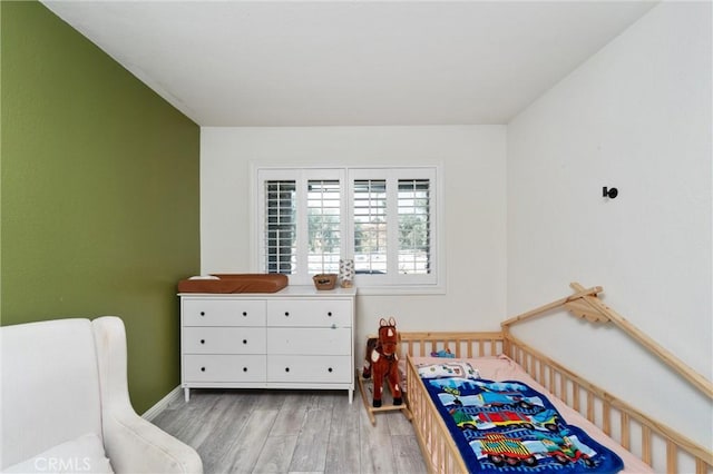8873 Reche Canyon Rd, Colton, CA 92324 - bedroom with light wood-style flooring and baseboards