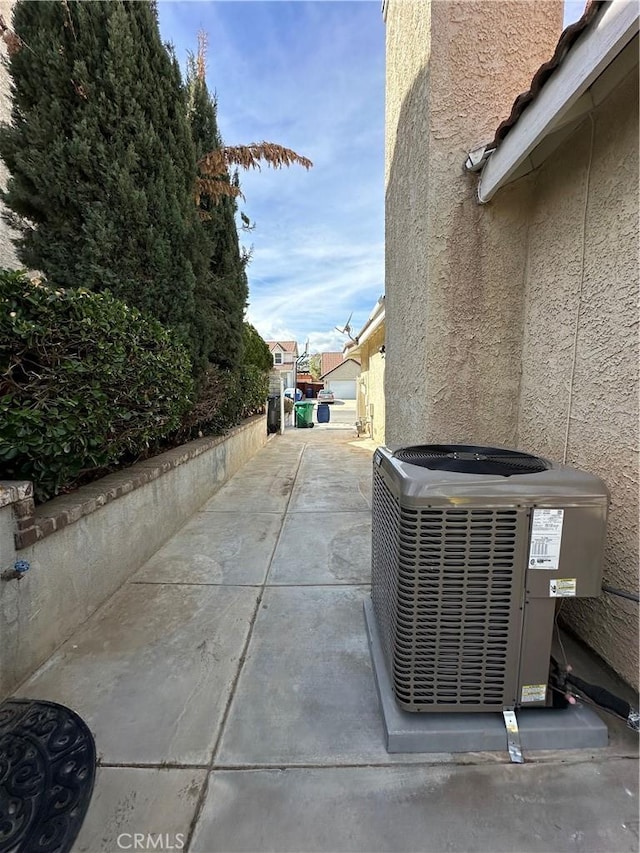 37510 Conifer Dr, Palmdale, CA 93550 - exterior view of a central air condition unit and stucco siding