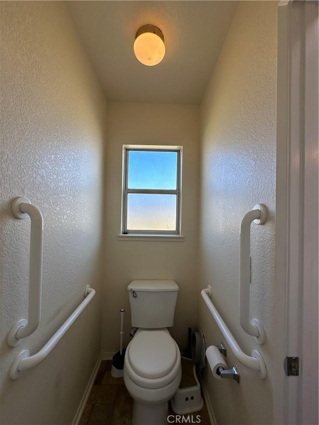 37510 Conifer Dr, Palmdale, CA 93550 - bathroom featuring toilet and baseboards