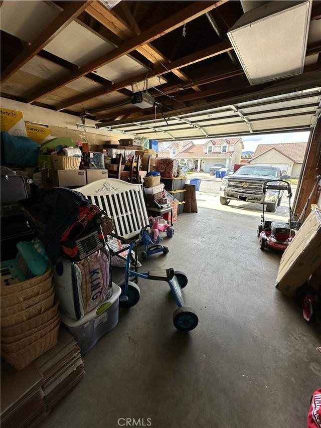 37510 Conifer Dr, Palmdale, CA 93550 - garage featuring a garage door opener