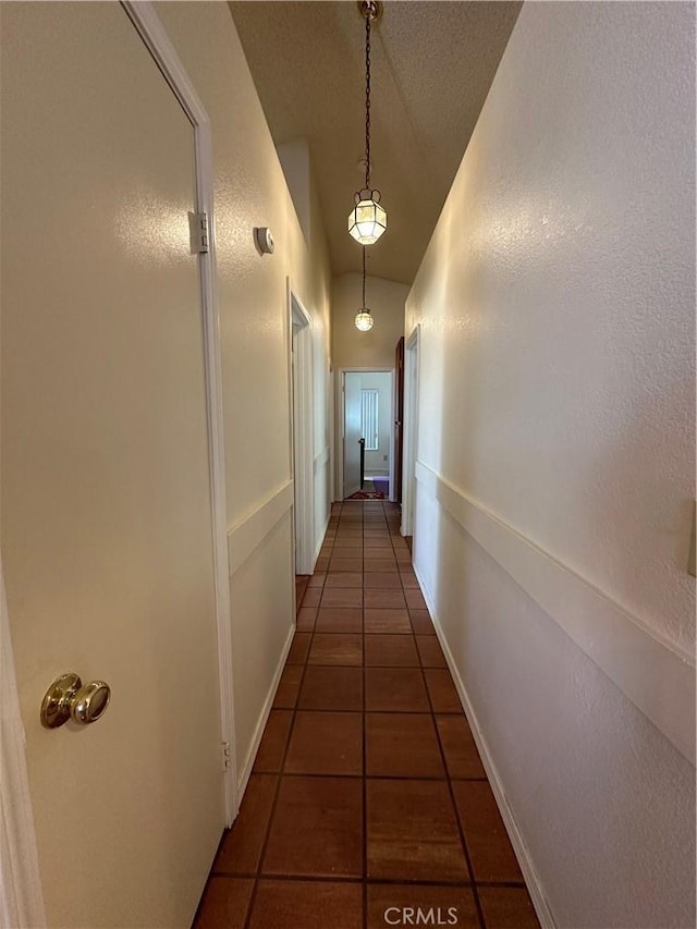 37510 Conifer Dr, Palmdale, CA 93550 - hall with tile patterned floors and lofted ceiling