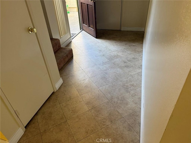 640 Juniper Way, La Habra, CA 90631 - hallway featuring light tile patterned floors and baseboards