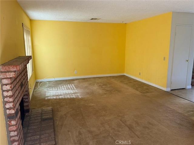 640 Juniper Way, La Habra, CA 90631 - unfurnished living room with carpet floors, a textured ceiling, and a fireplace