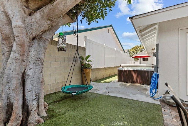23906 Fernmead Ln, Harbor City, CA 90710 - fenced backyard featuring a patio area and a hot tub
