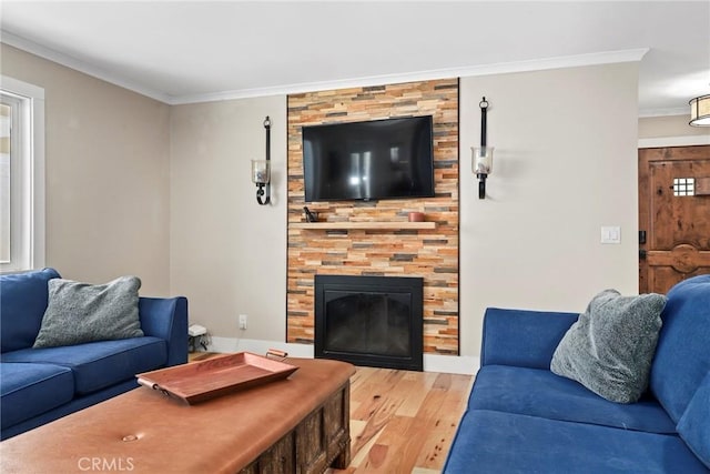 23906 Fernmead Ln, Harbor City, CA 90710 - living area with crown molding, light wood-style flooring, and a large fireplace