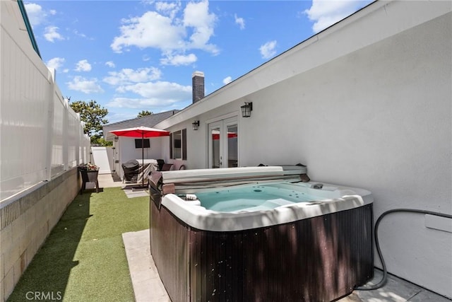 23906 Fernmead Ln, Harbor City, CA 90710 - view of patio / terrace featuring a hot tub and french doors