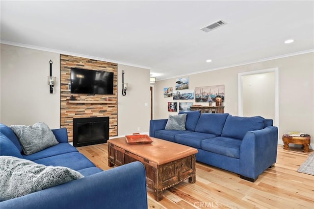23906 Fernmead Ln, Harbor City, CA 90710 - living room with light wood-type flooring, crown molding, a fireplace, and recessed lighting