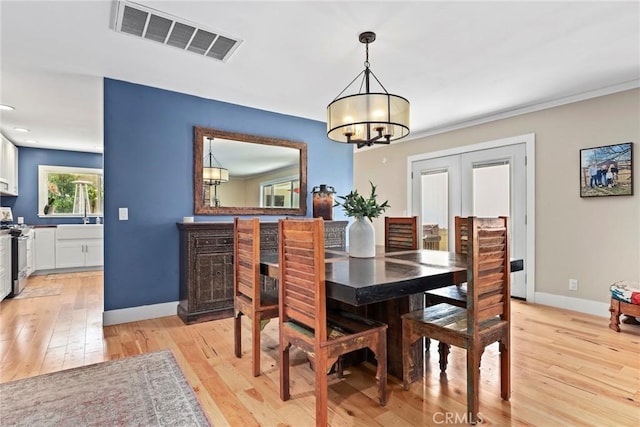 23906 Fernmead Ln, Harbor City, CA 90710 - dining room with light wood finished floors, a chandelier, and recessed lighting