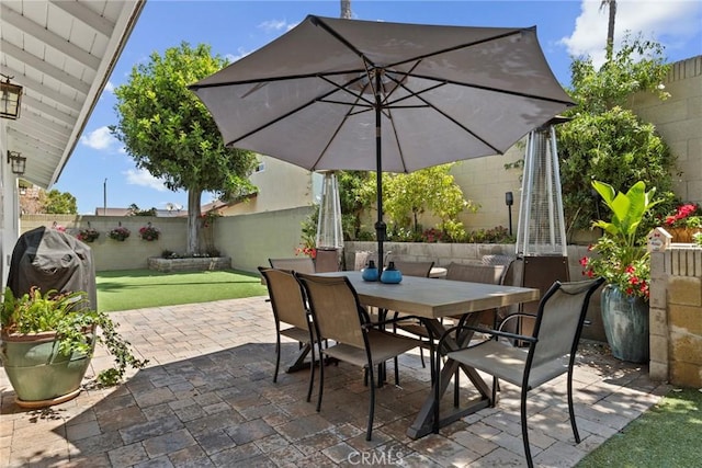 23906 Fernmead Ln, Harbor City, CA 90710 - fenced backyard featuring outdoor dining space and a patio