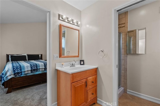 27124 Cabrera Ave, Saugus, CA 91350 - ensuite bathroom featuring vanity, a stall shower, and tile patterned floors