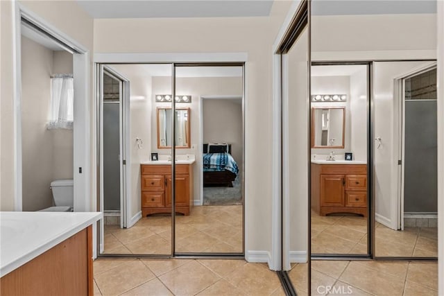 27124 Cabrera Ave, Saugus, CA 91350 - ensuite bathroom with vanity and tile patterned flooring