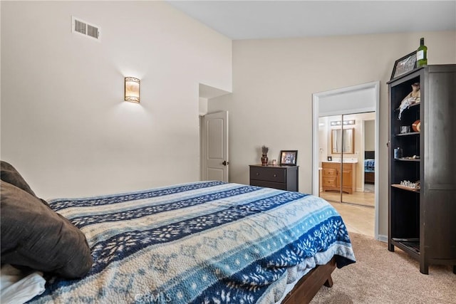 27124 Cabrera Ave, Saugus, CA 91350 - bedroom featuring light carpet and connected bathroom