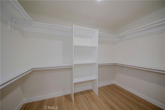 1615 Via Linda Unit 16, Fullerton, CA 92833 - walk in closet featuring wood finished floors