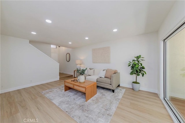 1615 Via Linda Unit 16, Fullerton, CA 92833 - living room featuring light wood-type flooring, stairs, and recessed lighting