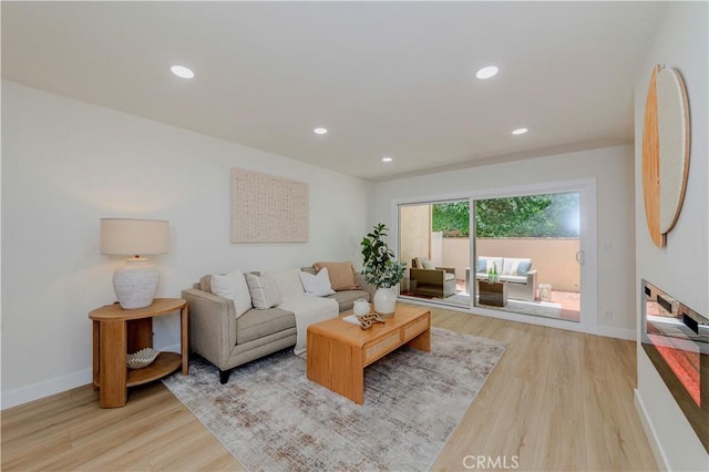 1615 Via Linda Unit 16, Fullerton, CA 92833 - living area featuring wood finished floors and recessed lighting