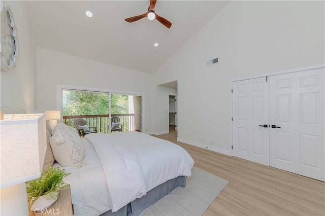 1615 Via Linda Unit 16, Fullerton, CA 92833 - bedroom featuring high vaulted ceiling, light wood-style flooring, a closet, ceiling fan, and access to exterior