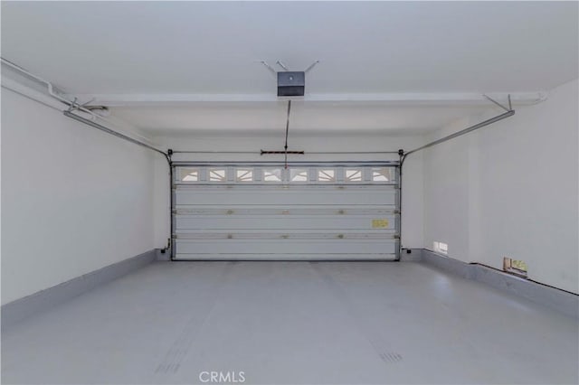 1615 Via Linda Unit 16, Fullerton, CA 92833 - garage featuring a garage door opener